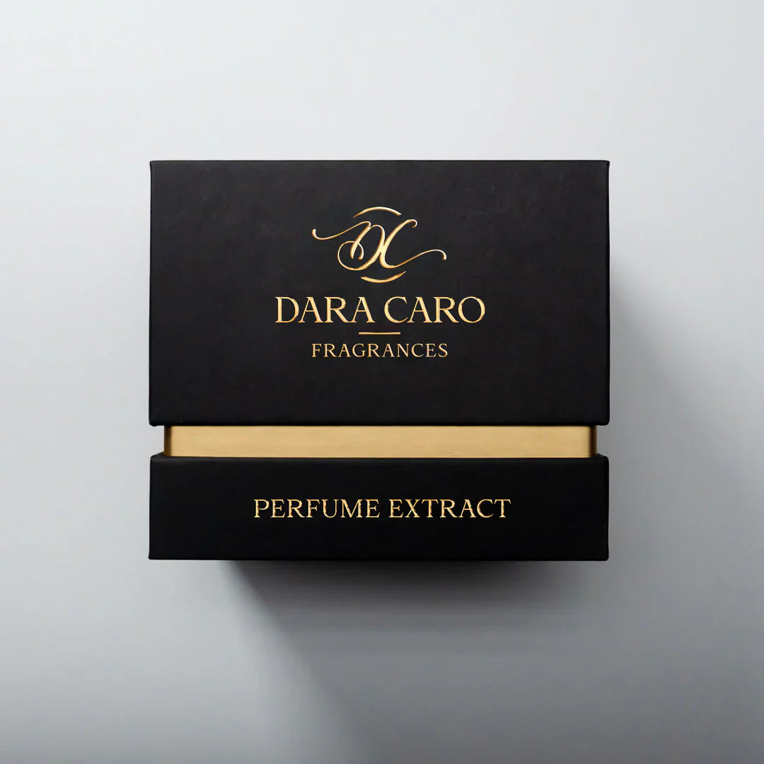 Black and gold words Dara Caro  Fragrances Perfume Extract fragrance box on white background 