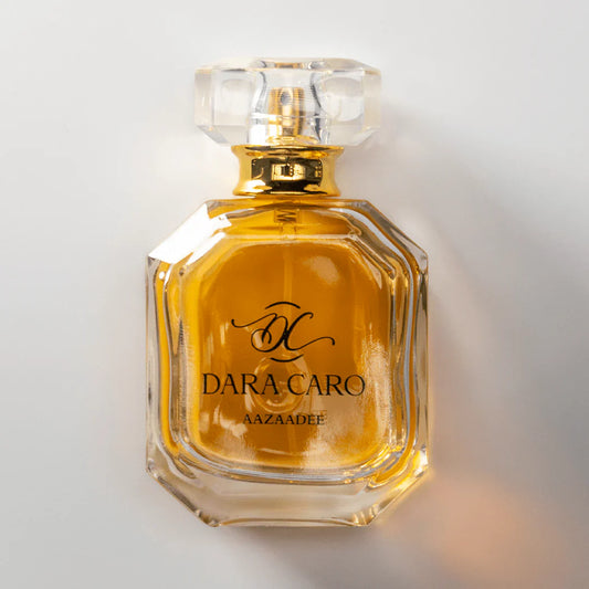 Perfume bottle labeled 'Dara Caro' on a light background