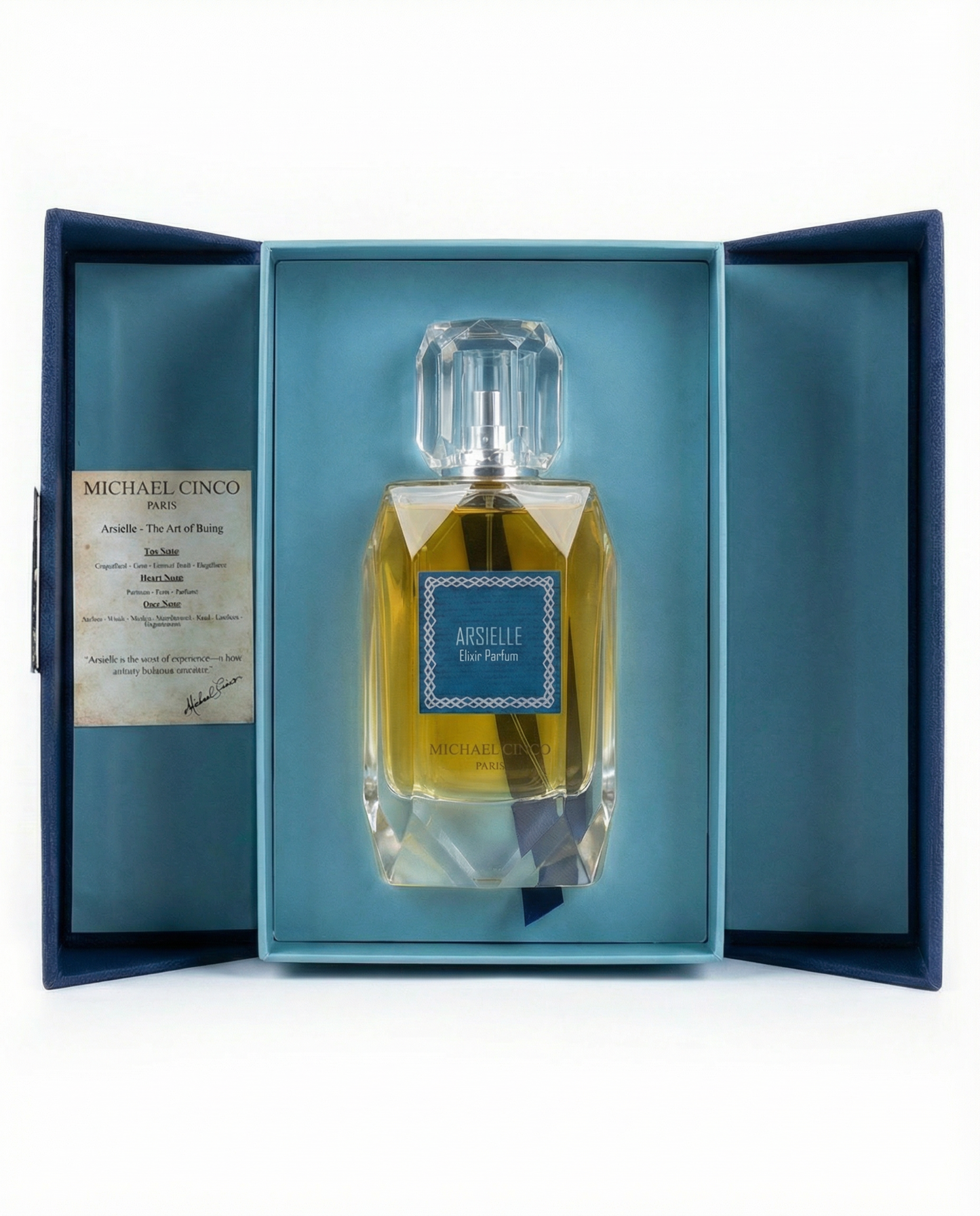 Michael Cinco Arselle Eau Parfum bottle displayed inside an open dark blue presentation box with a light blue insert and a certificate on the left.