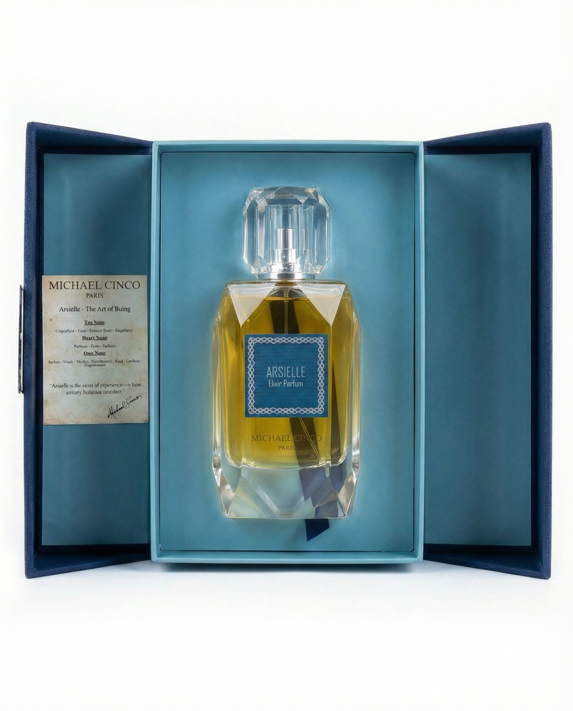 Michael Cinco Arselle Eau Parfum bottle displayed inside an open dark blue presentation box with a light blue insert and a certificate on the left.