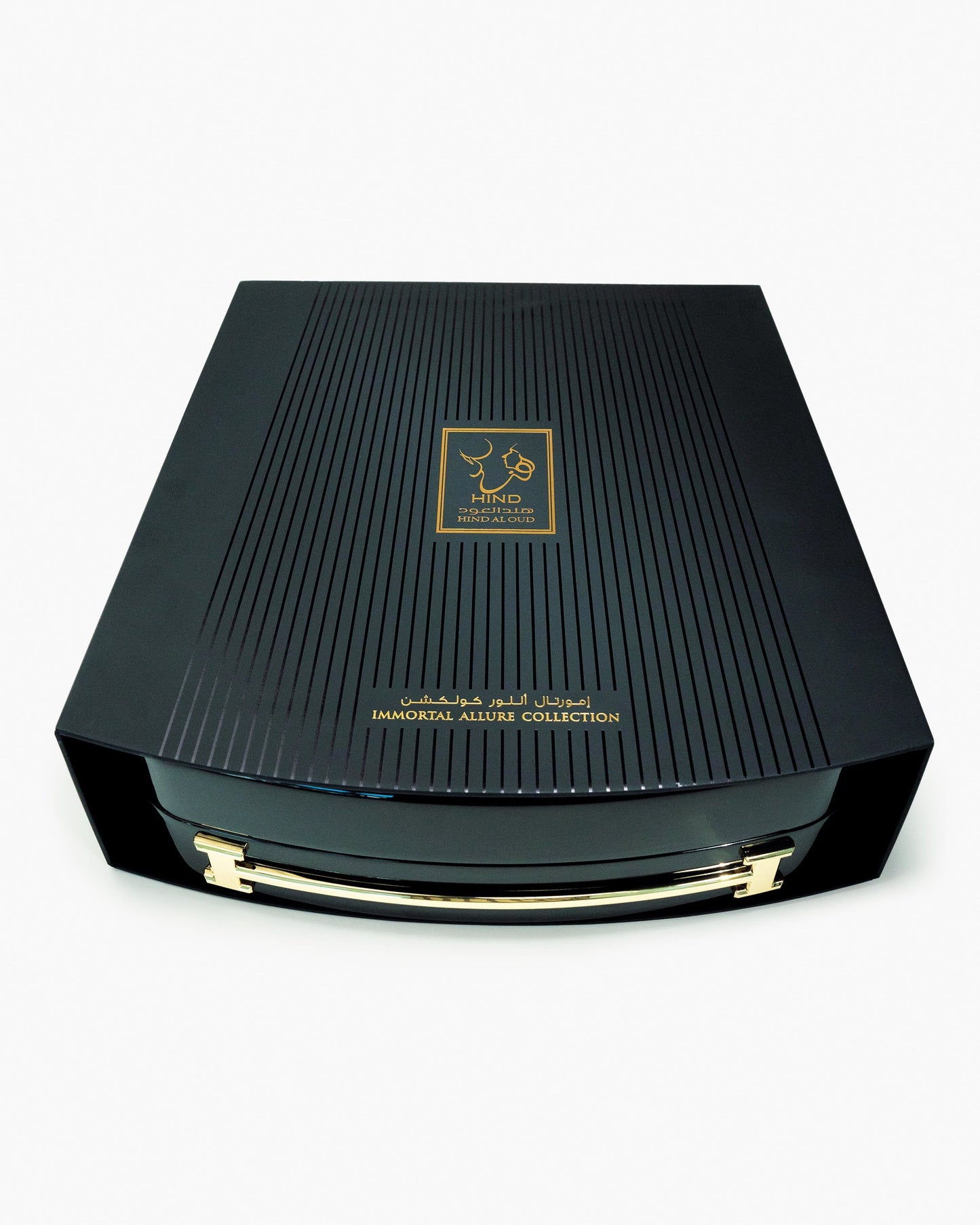 A luxurious black box with gold accents and Arabic text, labeled Immortal Allure Collection Gift Set by Hind Al Oud, displayed against a white background.