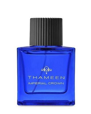 A blue rectangular bottle labeled "Imperial Crown Extrait de Parfum - Thameen London" by Fragrapedia Haus, with a black ribbed cap and a spicy woody scent inspired by the Imperial State Crown, is shown against a white background.