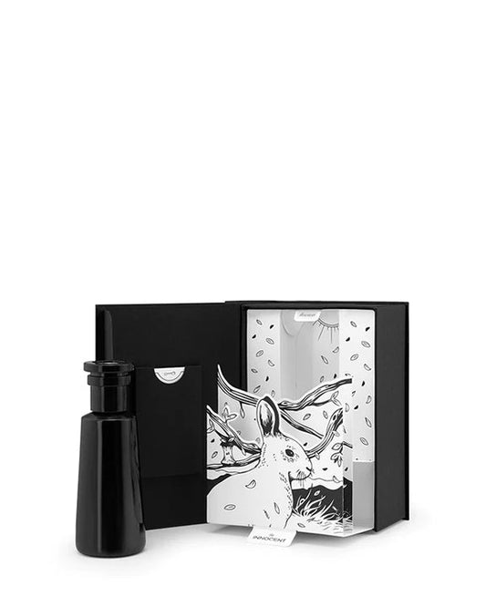 "Innocent" Eau de parfum by Argentum Black bottle and packaging with Rabbit illustration on a white background
