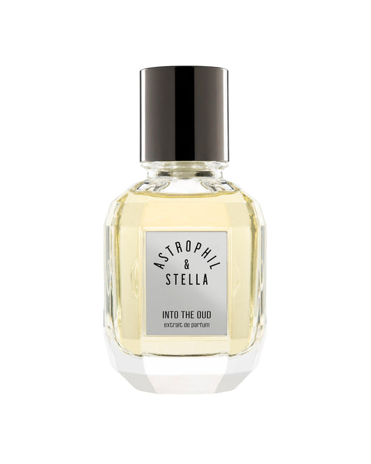 Bottle of fragrance with the words Into the Oud Extrait De Parfum by Astrophil & Stella