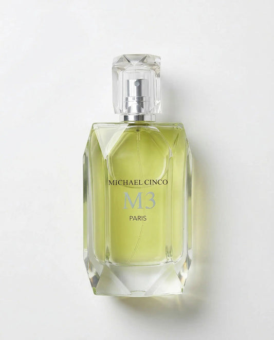 Perfume bottle labeled 'Michael Cinco M3 Paris' on a white background.
