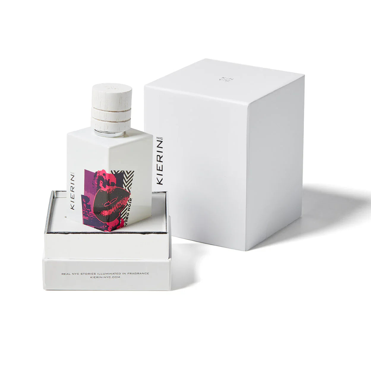 A white bottle of Kierin Nitro Noir Eau de Parfum with a vivid abstract label is displayed beside its open white box and lid on a white background—an elegant presentation for fans of luxury fragrance.