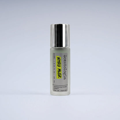 Nitro Musk Eau De Parfum by Scentologia  Perfume bottle with silver cap and gray body on a white background