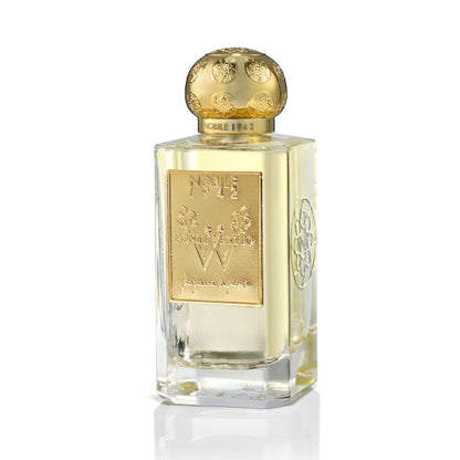 A clear glass perfume bottle with a gold ornate cap and label engraved with Nobile 1942 contains Pontevecchio W Eau de Parfum, a floral scent from the Fragranza Suprema Collection by Nobile 1942.