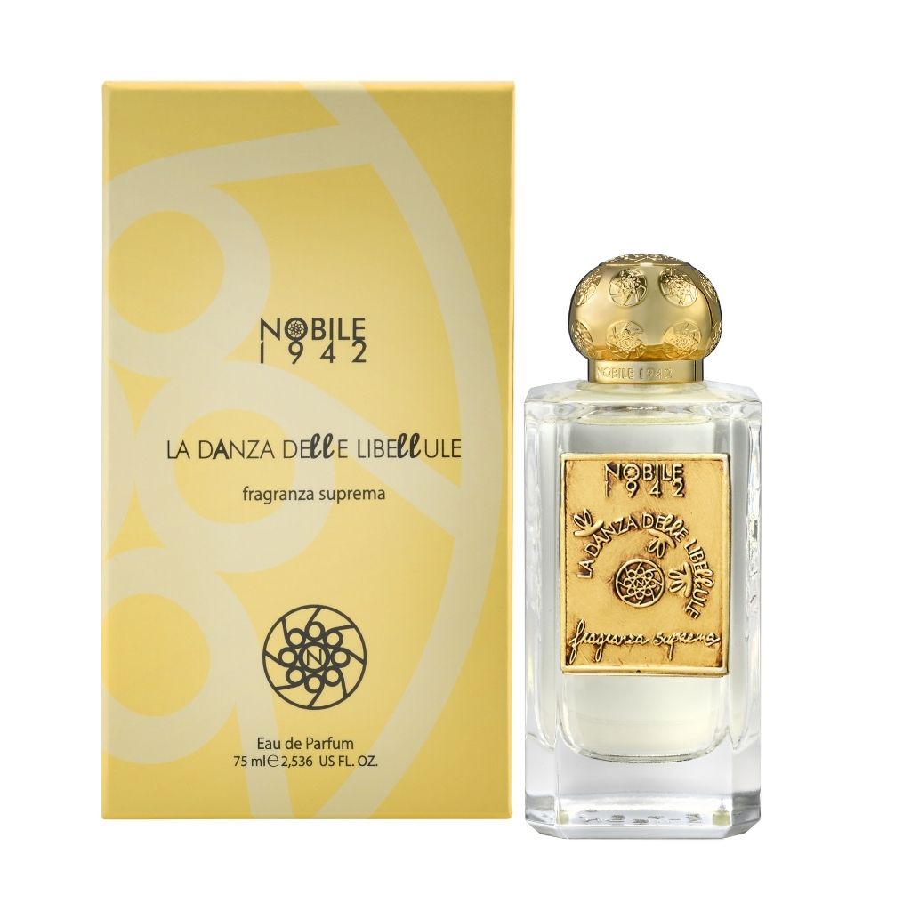 A bottle of LA DANZA DELLE LIBELLULE EDP by Nobile 1942, featuring an ornate gold label and cap, sits beside its yellow box displaying the brand and product name—ideal for fans of gourmand fragrances.