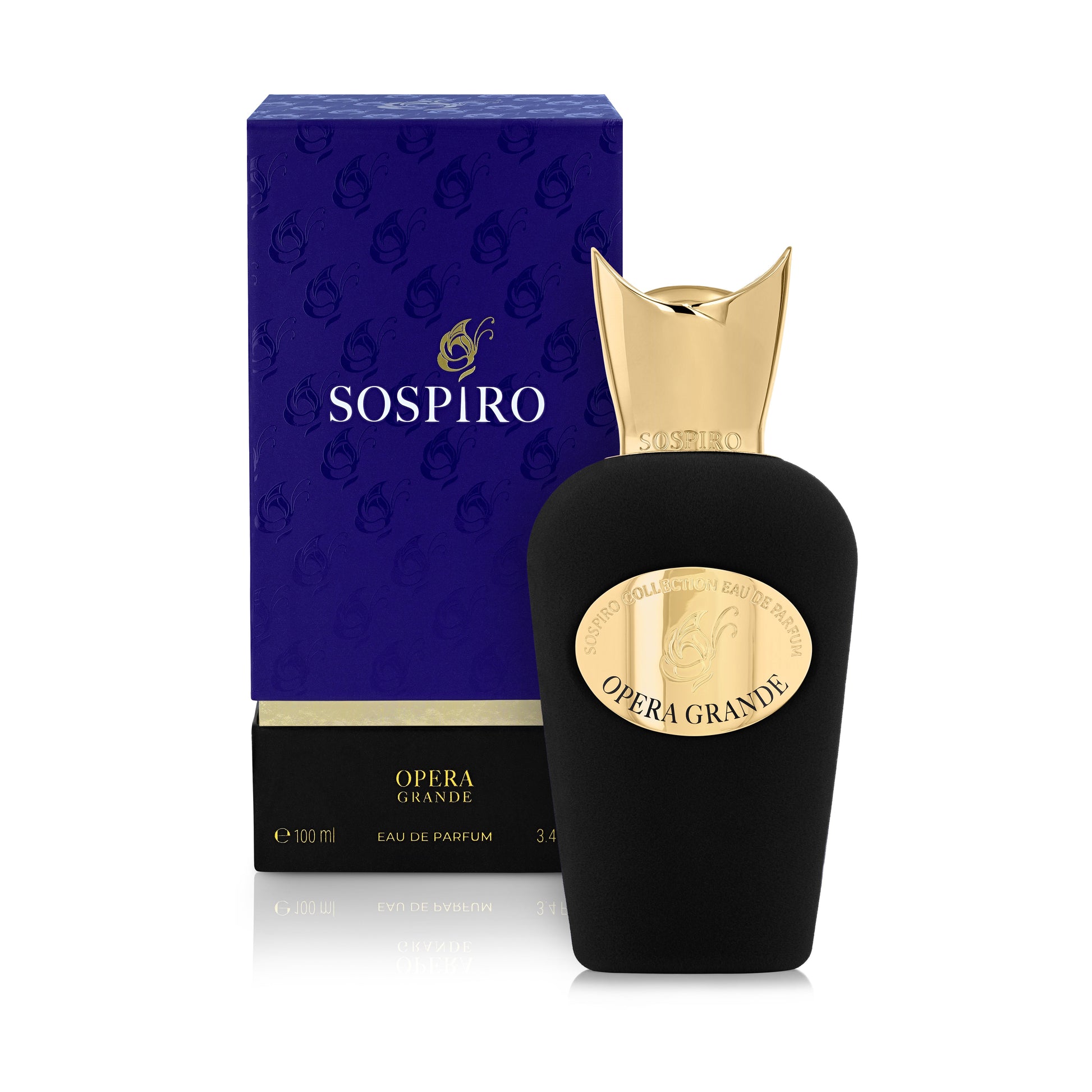 A black and gold Opera Grande Eau de Parfum by SOSPIRO stands before its matching blue and gold box. The elegant bottle, with a gold cap and oval label, suggests luxurious Turkish Rose notes within.