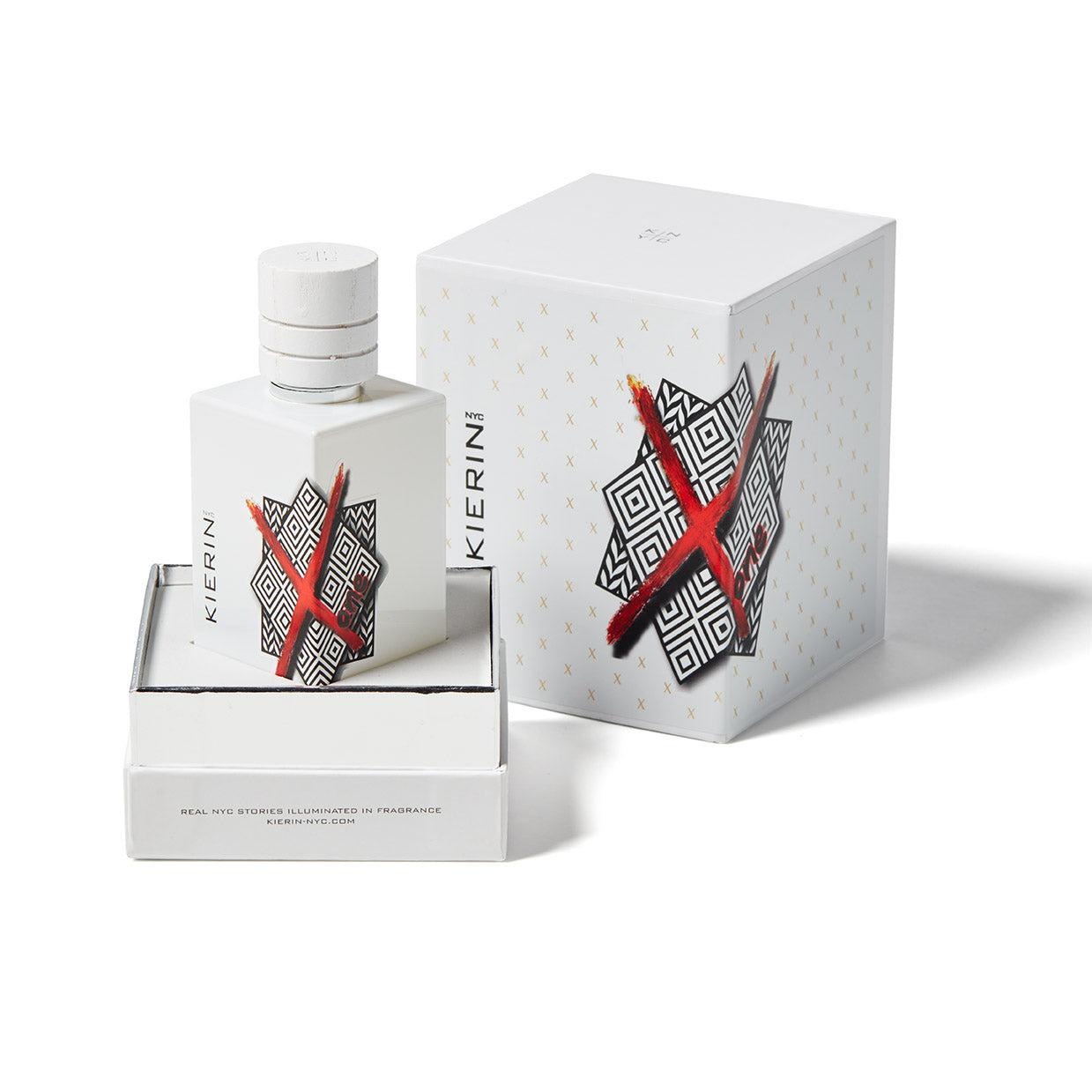 The ScentXOne Eau de Parfum by Kierin features a white bottle and box with geometric black patterns and bold red X designs, both labeled Kierin NYC, offering a long-lasting fragrance in stylish matching packaging.