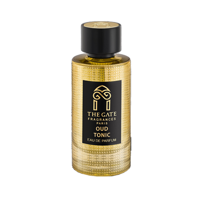 A gold textured bottle of Oud Tonic Eau de Parfum by The Gate Paris, featuring a black label and cap, is displayed against a white background.