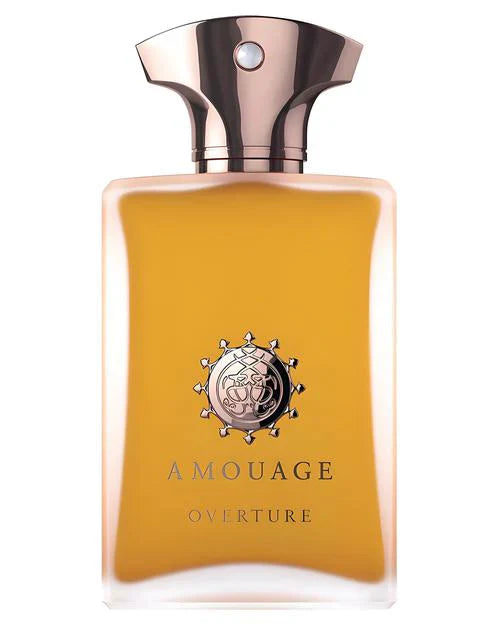 A rectangular bottle of Overtrue Man Eau de Parfum by Fragrapedia Haus, with a metallic cap and gold accents on clear glass. The amber liquid reflects its woody scent, making it ideal for men’s fragrance collections.
