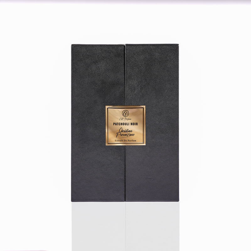 A black rectangular perfume box with a gold label reading Patchouli Noir Eau de Parfum by Christian Provenzano sits elegantly against a white background, showcasing this refined niche fragrance.