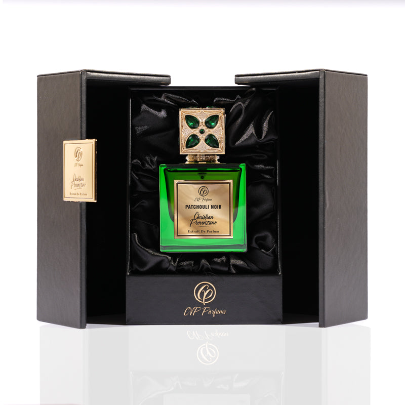 Patchouli Noir Eau de Parfum by Christian Provenzano comes in a black satin-lined box with a gold and green jeweled cap featuring the brand’s logo—a luxurious, distinctive patchouli fragrance for true niche scent lovers.
