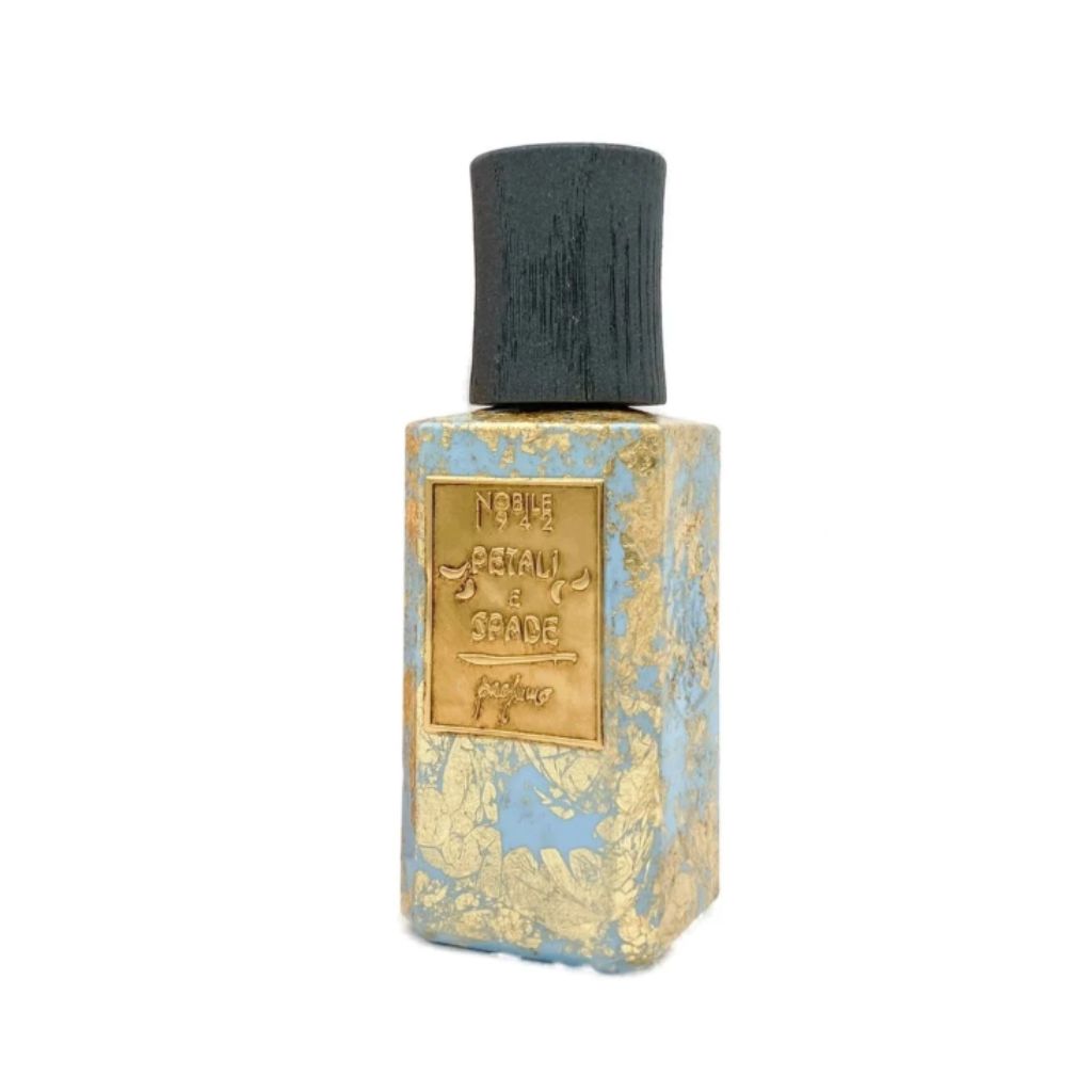 A rectangular PETALI E SPADE Eau de Parfum bottle by Nobile 1942, featuring a textured blue and gold marbled design, black cap, and a gold label engraved with the fragrance name.