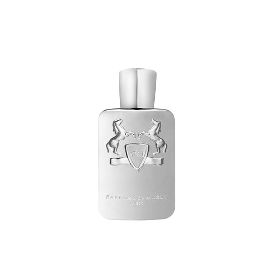 A sleek silver Pegasus Eau de Parfum bottle by Parfums de Marly features embossed rearing horses on a shield and "Parfums de Marly Paris" engraved below—an elegant almond-scented fragrance.