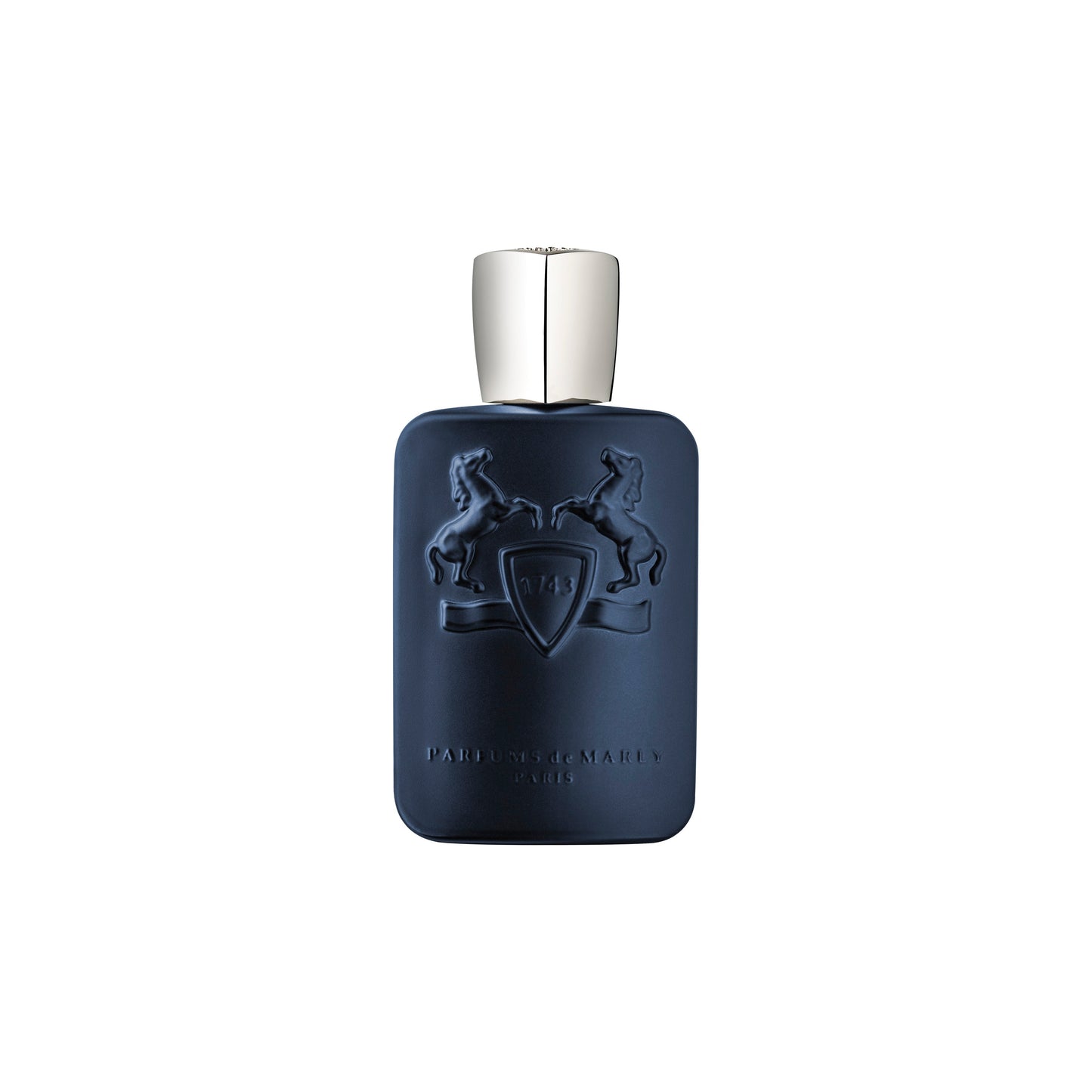 The Layton Eau de Parfum by Parfums de Marly comes in a dark blue bottle with a silver cap, embossed with two rearing horses and a shield, reflecting the elegance of Versailles. "Parfums de Marly Paris" appears at the bottom.