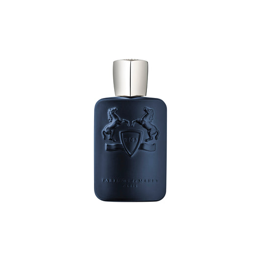 The Layton Eau de Parfum by Parfums de Marly comes in a dark blue bottle with a silver cap, embossed with two rearing horses and a shield, reflecting the elegance of Versailles. "Parfums de Marly Paris" appears at the bottom.