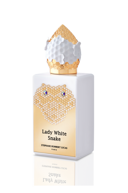 Lady White Snake Eau de Parfum by Fragrapedia Haus is a white floral scent in a gold honeycomb bottle with blue accents and a hexagonal gold cap, inspired by the Chinese legend.