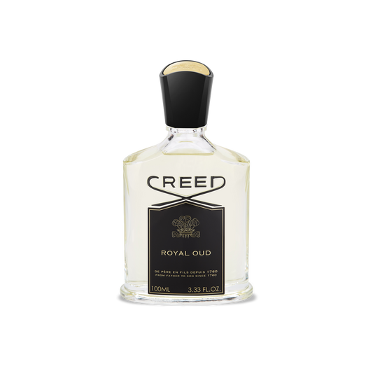 A 100ml clear glass bottle of CREED ROYAL OUD EDP by CREED, a woody spicy fragrance, features a black cap, a black and gold label with a gold emblem, and is photographed against a white background.