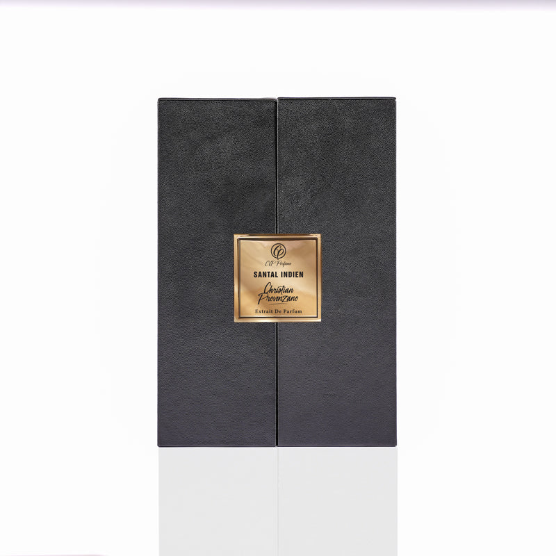 A sleek black rectangular box with a gold label reading "Santal Indien" by Christian Provenzano sits on a white background—an elegant sandalwood Eau de Parfum with refined undertones.