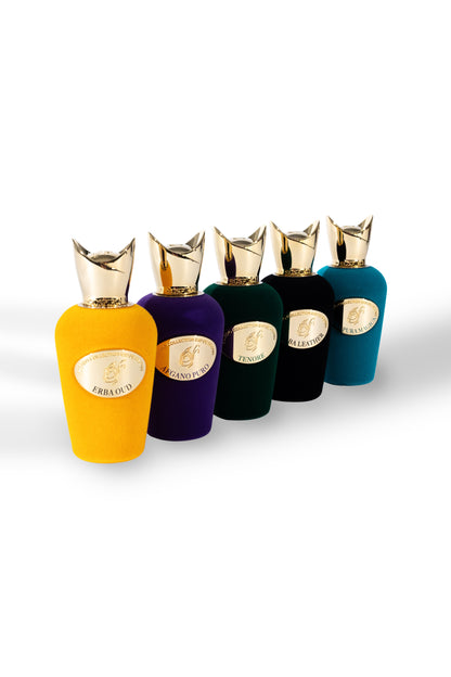 Five elegant bottles of SOSPIRO Afgano Puro Eau de Parfum in yellow, purple, green, black, and teal with gold caps and labels are arranged diagonally on a white background.