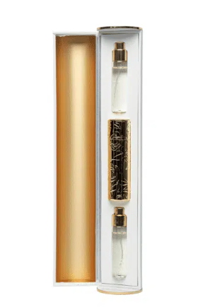 The COFFRET Moiré De Khala 30ML by Orens Parfums is a luxury gift set in a white and gold box, featuring two travel-size glass spray bottles and an ornate gold cylindrical oud perfume bottle with floral design.