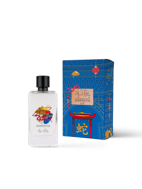 The SERPENTIA Eau de Parfum by Alfred Ritchy features an Asian-inspired bottle and a matching blue and red box with architectural and lantern motifs, ideal for celebrating Chinese New Year or the Year of the Snake.