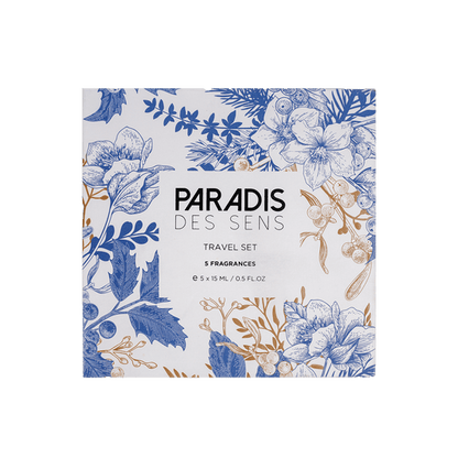 Square box labeled PARADIS DES SENS Travel Set features blue and gold floral designs on white. This set includes five 1 mL (0.03 fl oz) fragrances for a luxurious scent experience wherever you go.