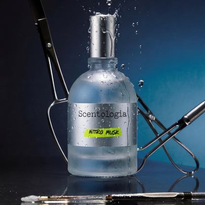 Nitro Musk Eau De Parfum by Scentologia perfume bottle with a blue gradient background and metal tools