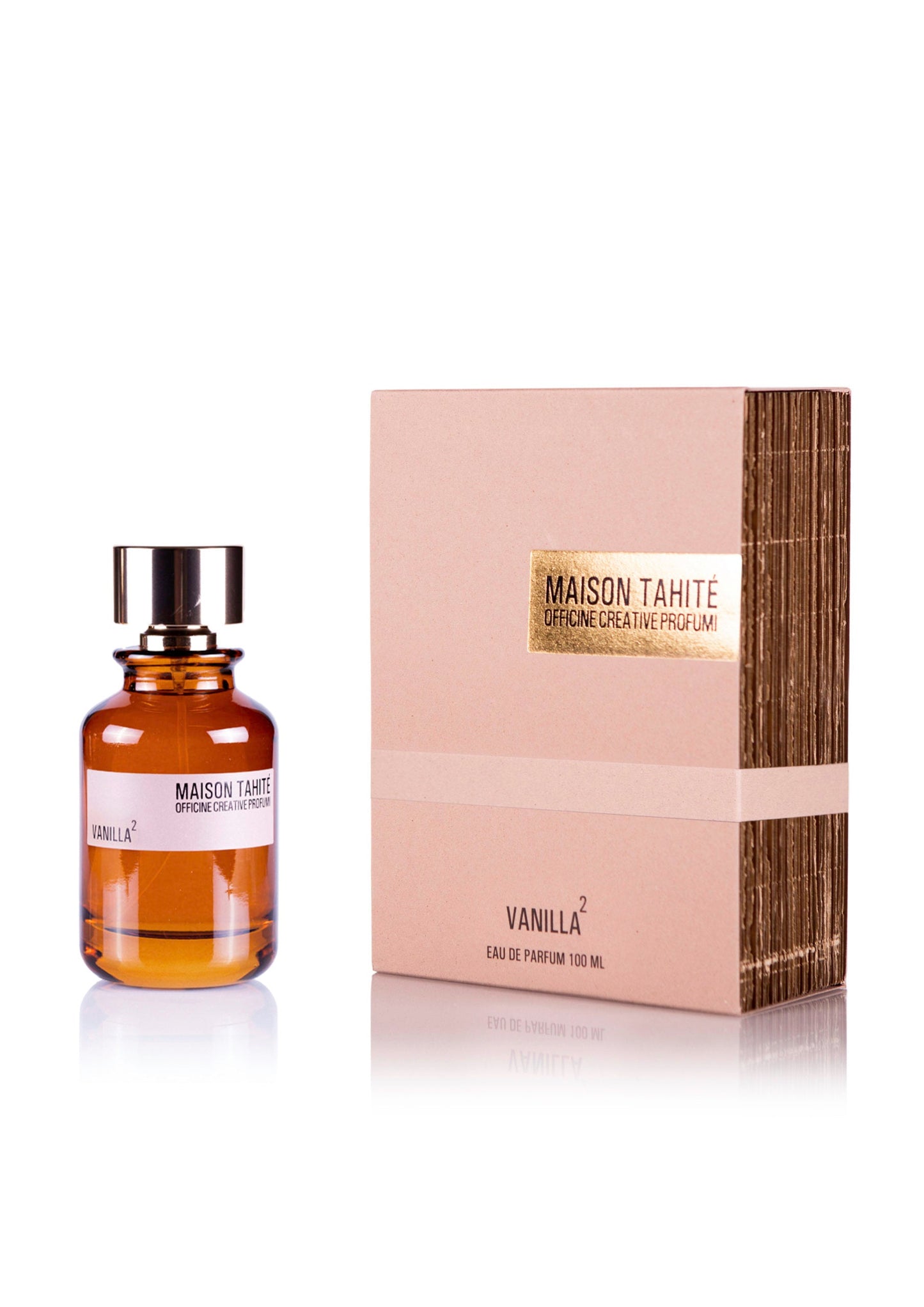 A bottle of Maison Tahite Vanilla 2 Eau de Parfum, a rich vanilla and praline scent, is displayed beside its beige and gold box, both featuring the Maison Tahite brand name and fragrance title.
