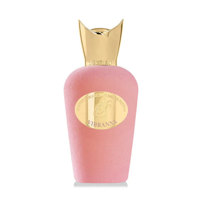 A pink SOSPIRO Vibranna Eau de Parfum bottle for women features a gold sculpted cap, an oval gold label reading "Vibrant," and a matte finish reflecting the powdery luminosity of its signature fragrance.