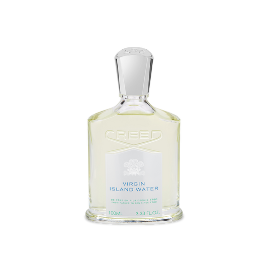 A clear 100ml glass bottle of CREED VIRGIN ISLAND WATER EDP by CREED, featuring a silver cap, embossed logo, white label with blue text, and a vibrant tropical scent with Jamaican lime notes.