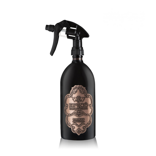 A black spray bottle featuring an ornate bronze label reading EPICO Bakhoor - Ambiance Spray - Epico Parfum, evoking oriental fragrance notes with hints of patchouli, set against a white background.
