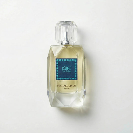 Perfume bottle labeled 'Céloré' by Michael Cinco on a light gray background