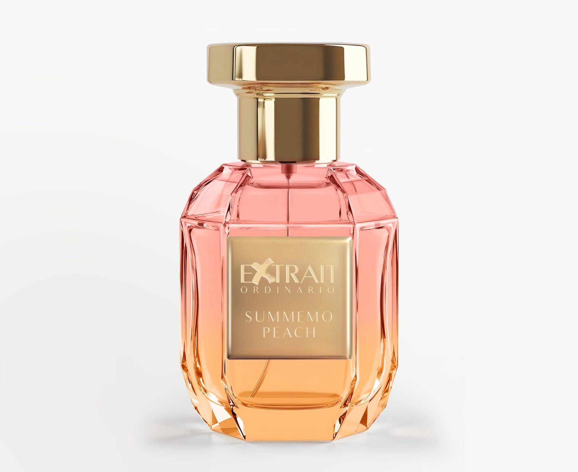 The faceted glass bottle with a gold cap holds Summemo Peach - Extrait Ordinario by Extrait Ordinario, its peach-toned fragrance captured in luxury. A gold plaque displays the name for an elegant summer touch.