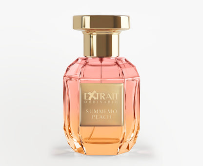 The faceted glass bottle with a gold cap holds Summemo Peach - Extrait Ordinario by Extrait Ordinario, its peach-toned fragrance captured in luxury. A gold plaque displays the name for an elegant summer touch.