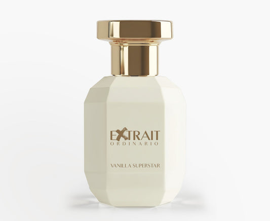 A white, faceted perfume bottle with a gold cap and gold lettering reading "Vanilla Superstar - Extrait Ordinario" by Extrait Ordinario. Ideal for fans of sweet, gourmand scents, shown on a plain white background.