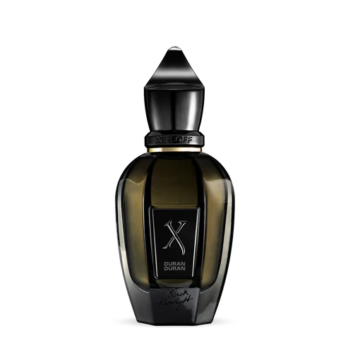 A sleek dark glass Black Moonlight Eau de Parfum bottle by Fragrapedia Haus, with a geometric black cap, XERJOFF and Duran Duran labels, plus a silver X and signature at the base, sits on a plain light background to evoke mystery.