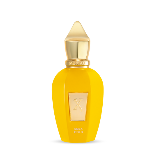A bright yellow perfume bottle with a gold cap and label displays "Fragrapedia Haus" and "Erba Gold Eau de Parfum." Its sleek, elegant design suggests a tropical fragrance with notes of Madagascar Vanilla.