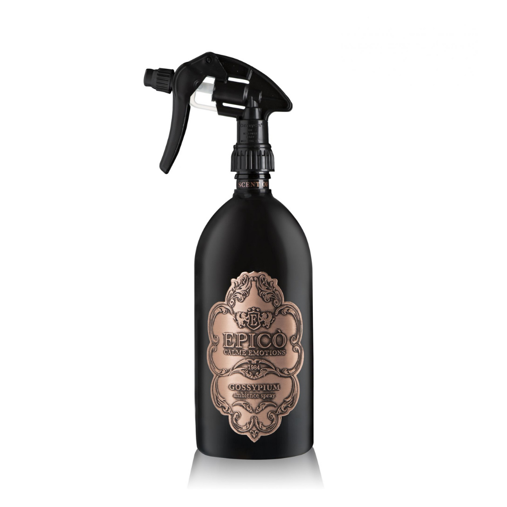 A black EPICO Gossypium Ambiance Spray features a gold and brown decorative design. Its black trigger nozzle with a transparent section adds elegance, perfect for enhancing your space with cherry blossom notes.