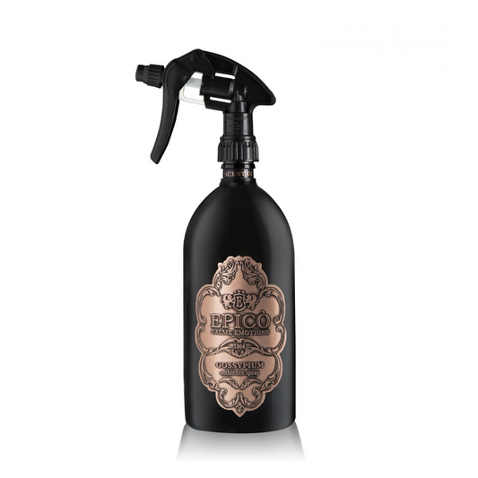 A black EPICO Gossypium Ambiance Spray features a gold and brown decorative design. Its black trigger nozzle with a transparent section adds elegance, perfect for enhancing your space with cherry blossom notes.
