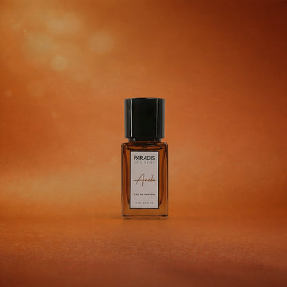 Perfume bottle labeled 'Paradis des Dies' on an orange background