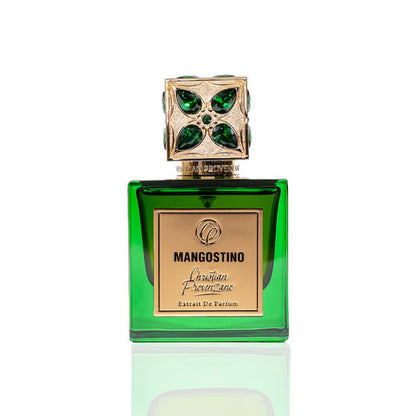 A green glass bottle of Mangostino Eau de Parfum by Christian Provenzano, featuring a gold cap with green gemstones, showcases this elegant unisex Oriental Woody fragrance against a white background.