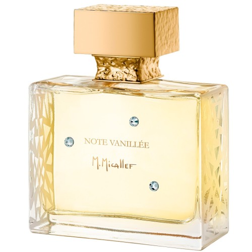 A rectangular glass bottle labeled NOTE VANILLEE Eau de Parfum by M.Micallef features gold accents, a textured gold cap, and decorative crystals, with sandalwood notes enhancing this luxurious vanilla fragrance.