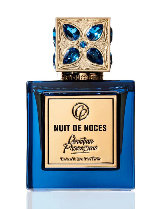 Nuit De Noces Extrait De Parfum by Christian Provenzano Blue perfume bottle with gold and blue accents on a white background