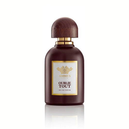 A dark brown perfume bottle with a rounded wooden cap and a gold label reading "AMIRIUS PARIS OUBLIE TOUT Eau de Parfum" from Amirius is elegantly displayed on a white background.