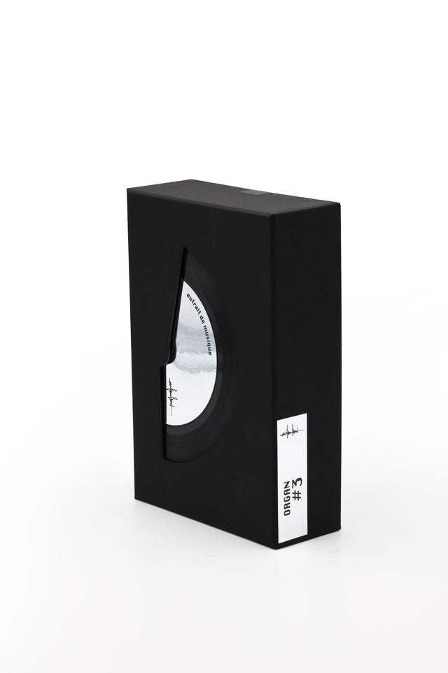 'Filippo Sorcinelli Organ #3'Black packaging box with a white product inside on a white background