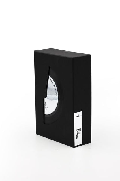 'Filippo Sorcinelli Organ #3'Black packaging box with a white product inside on a white background